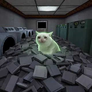 The cat buried to the chest in a pile of game cartridges